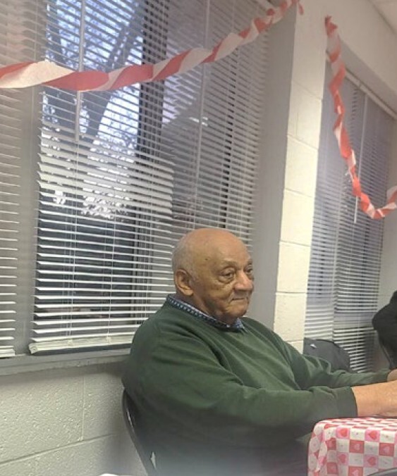 A man sitting at a table.