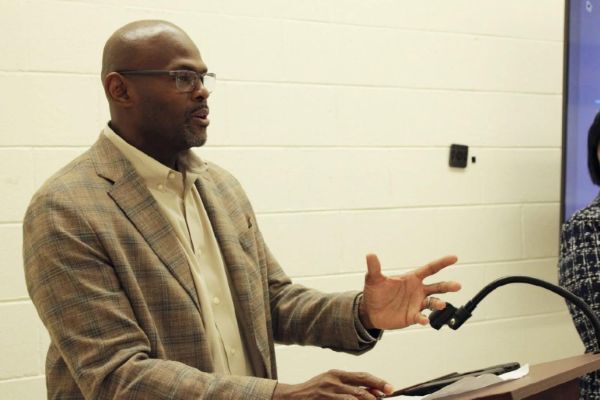 A man speaking at a podium.