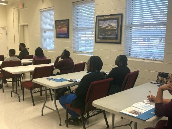 People sitting at tables.