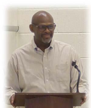 A man standing at a podium.