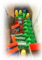 A box of various brands of laundry detergent.