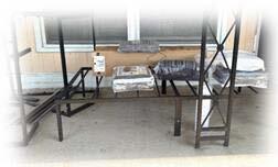 Packages on a wire shelf.