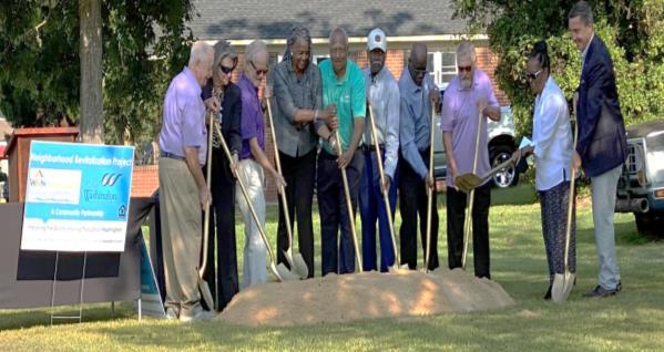 The BOC for the WHA all stand together to Break Ground with their shovels on the new development