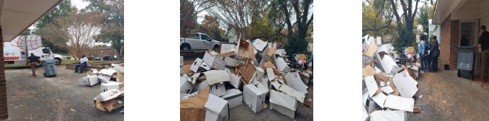 A pile of boxes to be shredded outside of an old pool house.