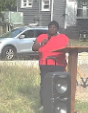 Woman speaking at a podium. 