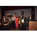 Commissioners and Executive Director receiving a plaque