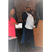 A man walking with his plaque