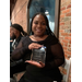 Young lady holding her award