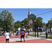 White jersey in mid-air trying to dunk
