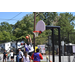 Two guys in mid-air near the hoop