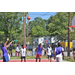 Players prepare to get the ball after purple jersey's free throw