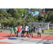 White jersey and green jersey teams are preparing to play ball