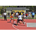 Orange jersey gets closer to the basket