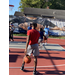 Young man running to the basket to make a shot