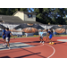 Two players about to shoot practice shots from the 3-point line