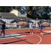 Young man in a light blue shirt shooting the ball