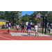 Players watch as guy shoots a free throw