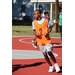 Kid in orange jogging to get the ball