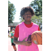 Pink jersey and red shirt holding the ball