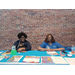 Two women sitting at table.