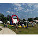 Kids waiting in line for the inflatables.