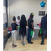  Four kids standing in a line. 