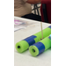  Green noodles with blue tape made into a boat. 