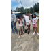  Five girls pose for a picture. 