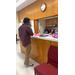  A man looking at all the boat projects. 