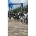  Another view of a large group of people walking thru the big machine that moves boats. 
