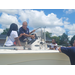  A man talks about the steering column of the boat. 