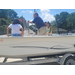  A man educating kids about the boat. 