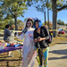  A mother and daughter walk around in Halloween costumes. 
