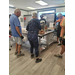  Volunteers prepping food in a kitchen. 