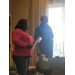  Two people standing and talking. 
