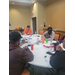 People are working at tables. 
