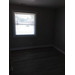  A bedroom with a window. 