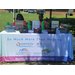 The Washington Housing Authority table set up under a tent. 