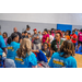  Volunteers and students at an event. 